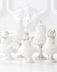 Glittered White Resin Cake on Silver Stand