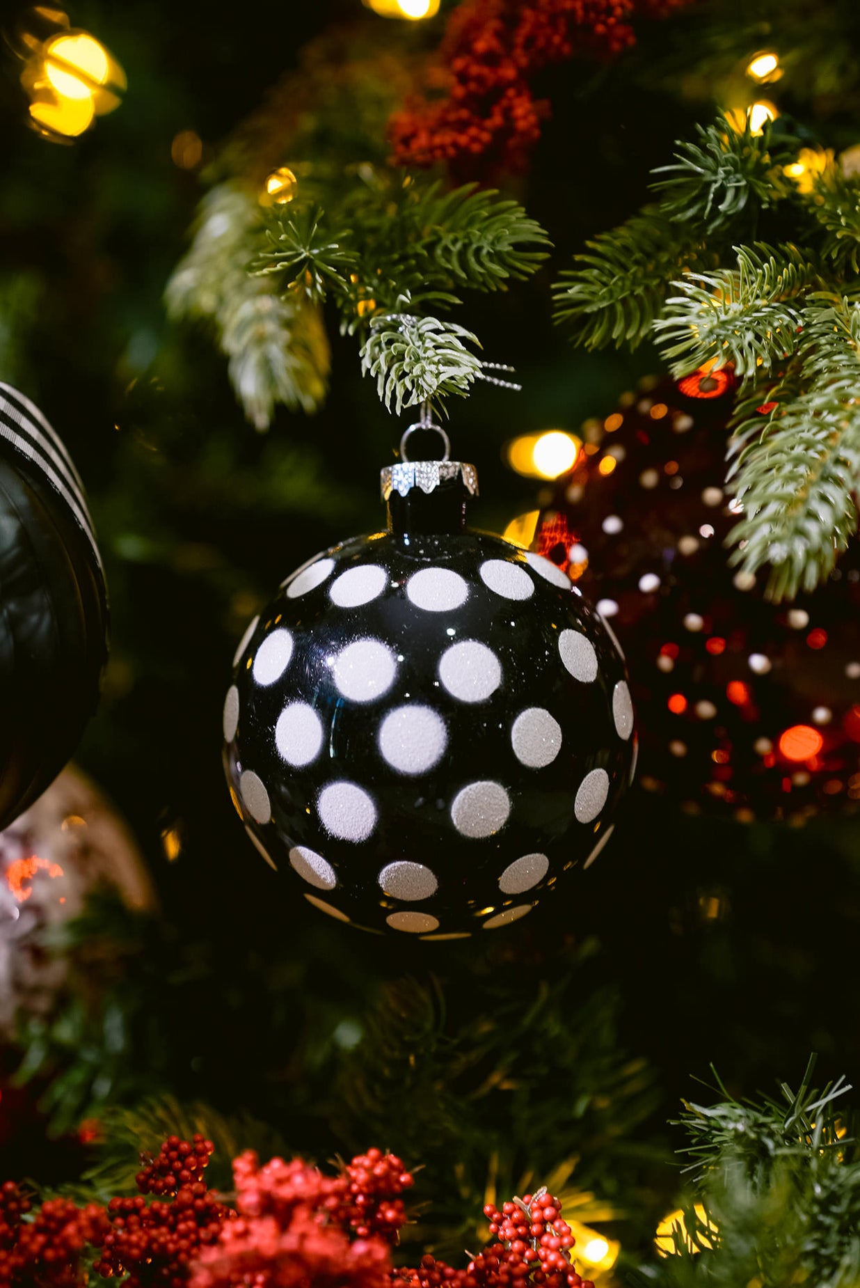 black and white Christmas tree with black and white polka dot ornaments 