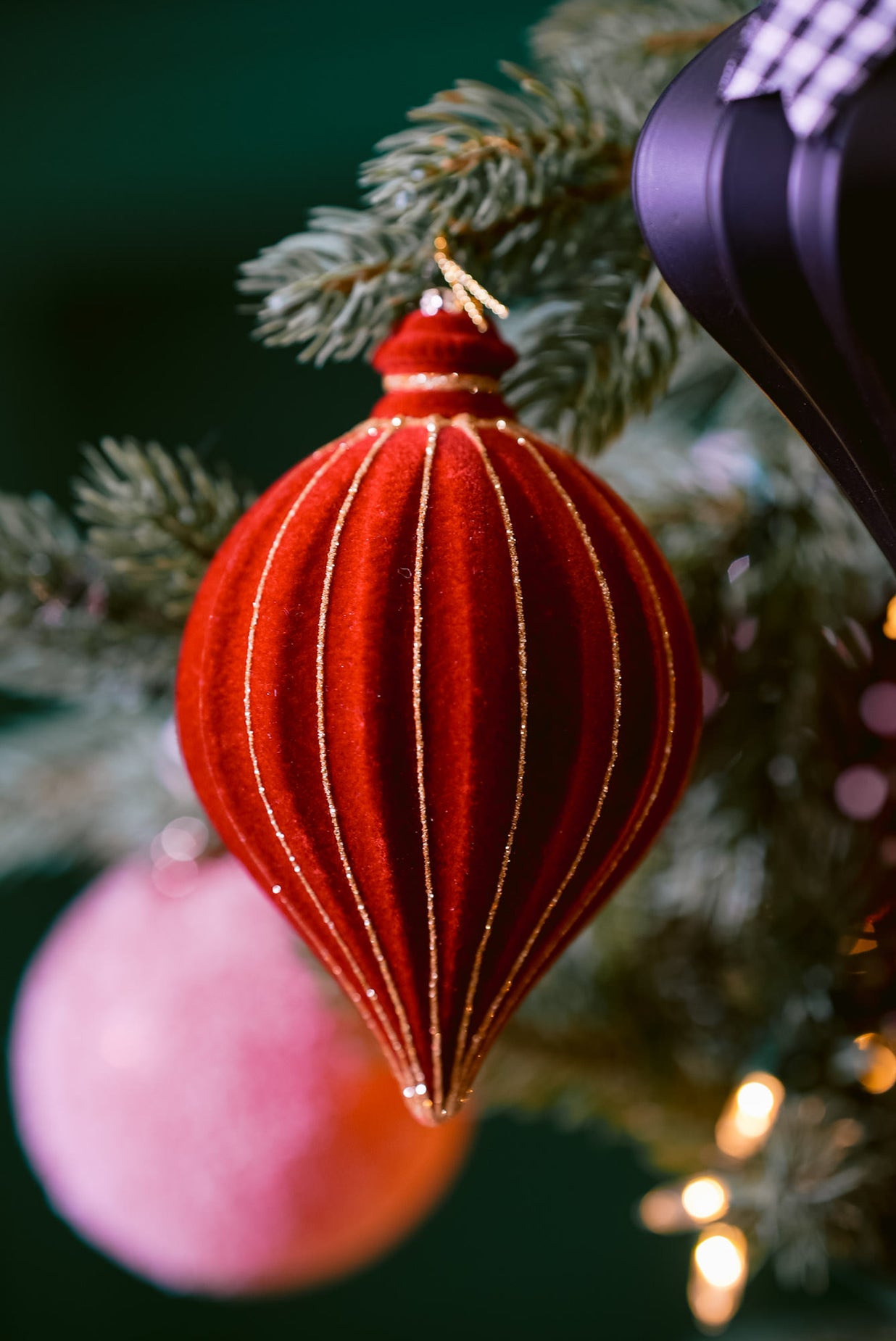 black and white Christmas tree with red ornaments 